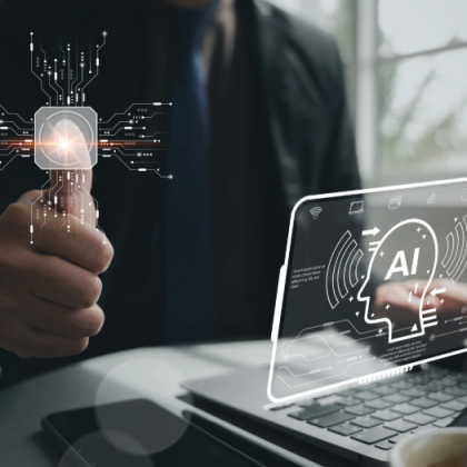 iemand achter een computer met A.i. erop 